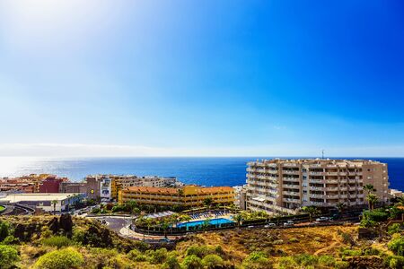 Coast or Shore of Atlantic Ocean with Buildings Landscape on Canary Island at Dayのeditorial素材