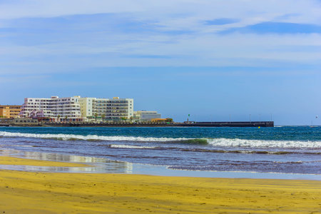 Sand Beach Coast or Shore of Atlantic Ocean with Buildings Landscape on Tenerife Island in Spain at...