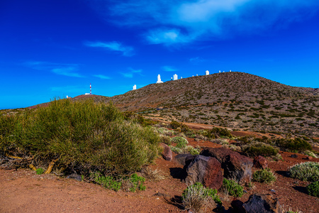 Landscape with Astronomical Observatory Telescopes at Background in Tenerife Canary Island in Spainの写真素材