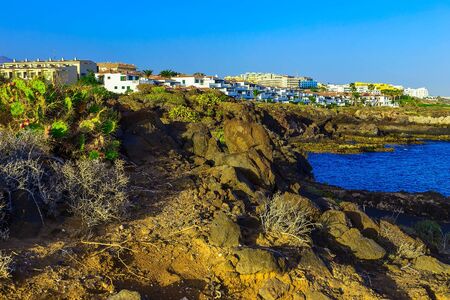 Landscape with City on Atlantic Ocean Coast or Shore with footpath on  Tenerife Island at Dayの写真素材