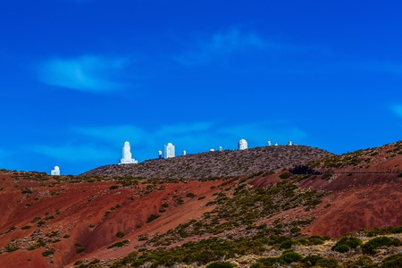Landscape with Astronomical Observatory Telescopes at Background in Tenerife Canary Island in Spainの写真素材