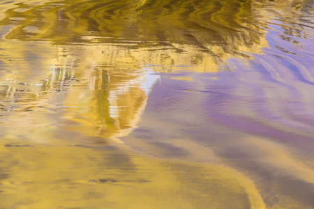 Abstract Background with Sand and Building Reflection in Waterの写真素材