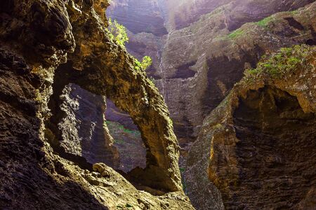 Narural Arch in Rocky Mountains on Tenerife Canary island in Spain at Dayの写真素材