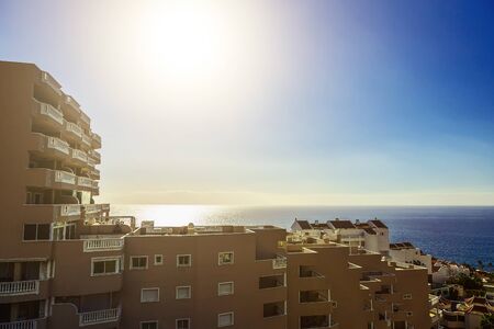 Coast or Shore of Atlantic Ocean with Buildings Seascape on Tenerife Island in Spain at Dayの写真素材
