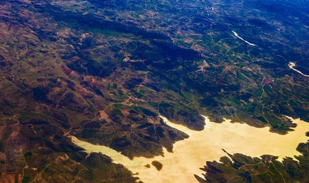 Earth and City Aerial view from Planeの写真素材