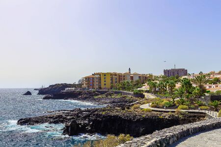 Rock Coast or Shore of Atlantic Ocean with Buildings Landscape on Canary Islandのeditorial素材