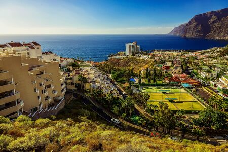 Coast or Shore of Atlantic Ocean with Buildings Seascape on Tenerife Island in Spainの写真素材