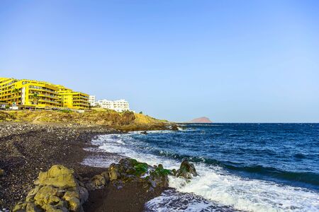 Rock Coast or Shore of Atlantic Ocean with Buildings Seascape on Canary Islandのeditorial素材
