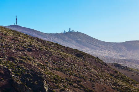 Landscape with Astronomical Observatory Telescopes at Background in Tenerife Canary Island in Spainの写真素材