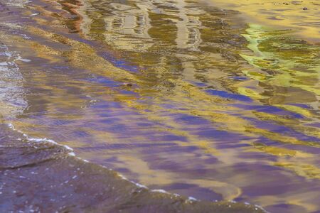 Abstract Background with Sand and Building Reflection in Waterの写真素材