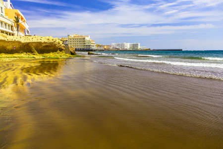 Sand Beach Coast or Shore of Atlantic Ocean with Buildings Landscape on Canary Island in Spainの写真素材