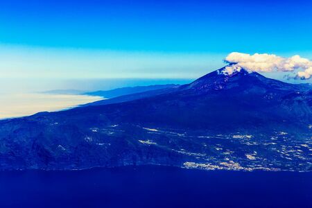 Tenerife Canary Island Shore or Coast with Teide Volcano and Sky with Clouds Aerial Viewの写真素材