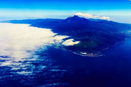 Tenerife Canary Island Shore or Coast with Teide Volcano and Sky with Clouds Aerial Viewの写真素材