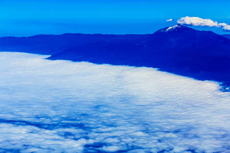 Tenerife Canary Island Shore or Coast with Teide Volcano and Sky with Clouds Aerial Viewの写真素材