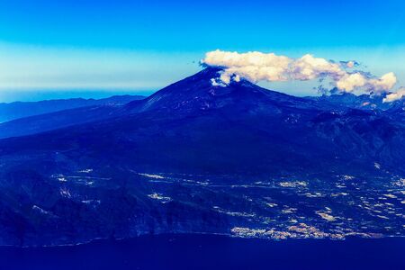 Tenerife Canary Island Shore or Coast with Teide Volcano and Sky with Clouds Aerial Viewの写真素材