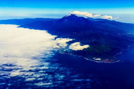 Tenerife Canary Island Shore or Coast with Teide Volcano and Sky with Clouds Aerial Viewの写真素材
