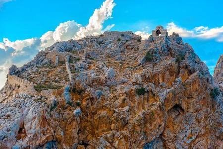 Ruins of Alanya castle at top of rock on sky background, Turkeyの写真素材