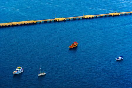 Aerial view on boats near pier in port of Alanya, Turkeyの写真素材