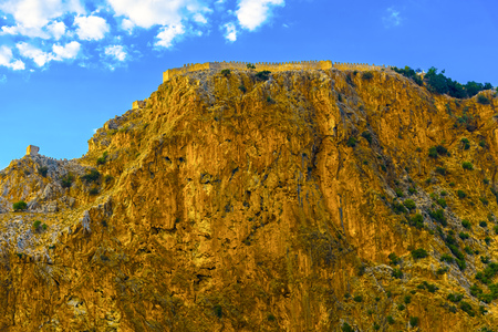 Castle wall on mountainl on sky background in Alanya, Turkeyの写真素材