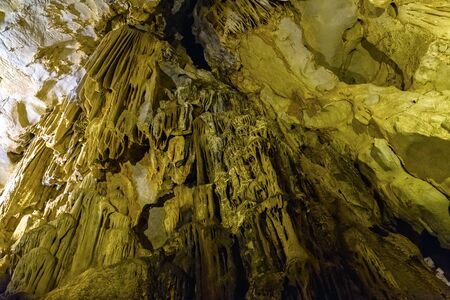 Cave texture background with Stalactite and Stalagmite Formations in the Dim Cave in Alanya, Turkeyの写真素材