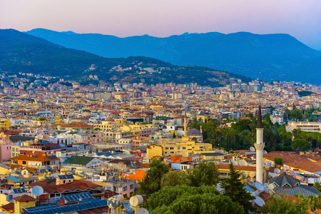 View of Alanya cityscape on background of mountains at sunset, Turkeyの写真素材