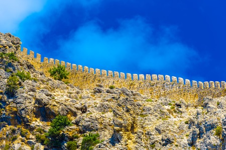 Beautiful view of ancient fortress on background of sky in Alanya, Turkeyの写真素材