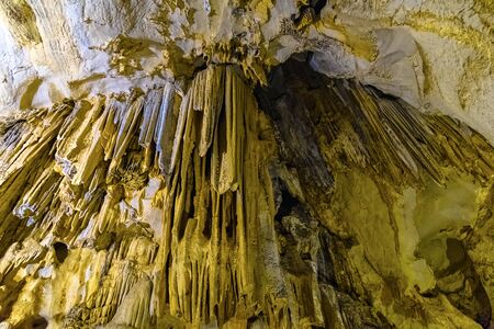 Cave texture background with Stalactite and Stalagmite Formations in the Dim Cave in Alanya, Turkeyの写真素材