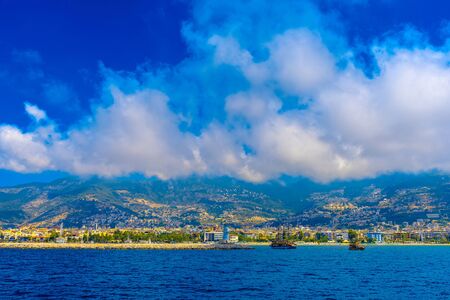 View on lighthouse in the harbor town of Alanya at sunset, Turkeyの写真素材