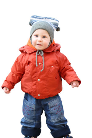 The little boy in outer clothing costs on a white backgroundの写真素材