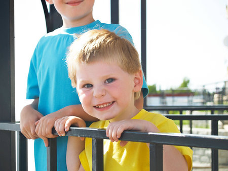 two boys play  in the springの写真素材