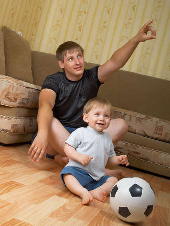 The daddy with the son play together housesの写真素材
