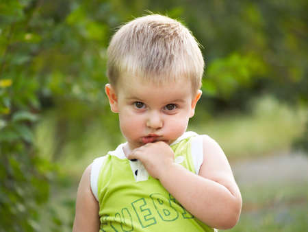 The boy on walk in the summerの写真素材