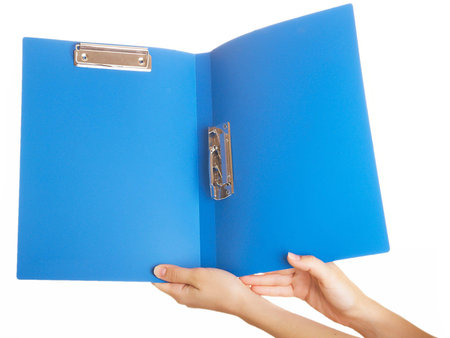 Blue folder for papers in a hand on a white background