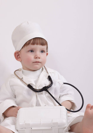 Small child play hospital and doctorの写真素材