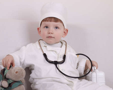 Small child play hospital and doctorの写真素材