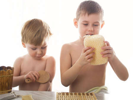 Two beautiful boys washの写真素材