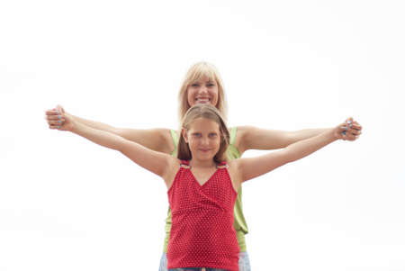 Mum with a daughter outdoor on backgroundの写真素材