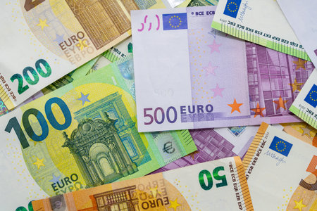 European currency lies on the table. Banknotes five hundred, one hundred, two hundred, fifty euros...