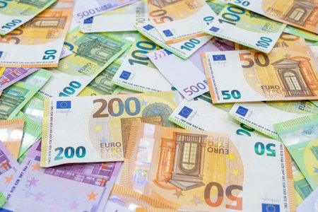 European currency lies on the table. Banknotes one hundred, two hundred, fifty, five hundred euros...