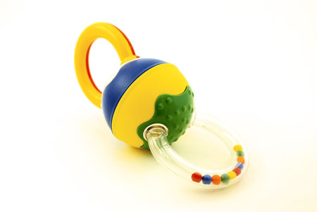 Close-up image of the baby rattle with white background.