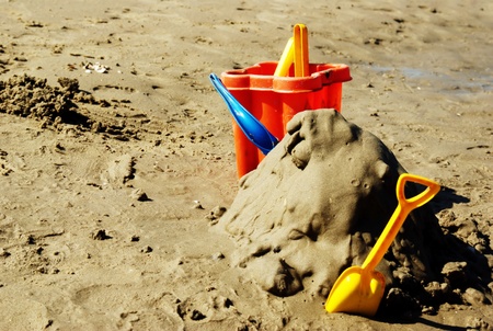 Plastic toys on beach.の写真素材