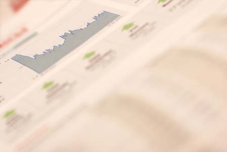 Money and stock selection in newspaperの写真素材