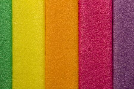 multicolored strips of yellow, pink, purple, orange backgroundの写真素材