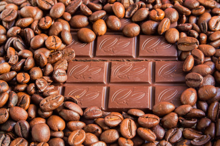 chocolate and coffee beans are roasted Brown backgroundの写真素材