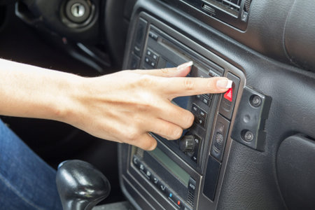 close-up of a girl's hand with beautiful manicure in Salon car