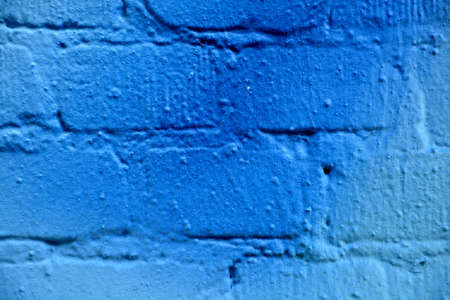 Grunge stone wall with old paintの写真素材