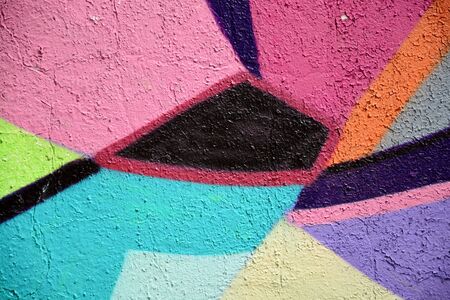 Old wall with colorful graffitiのeditorial素材