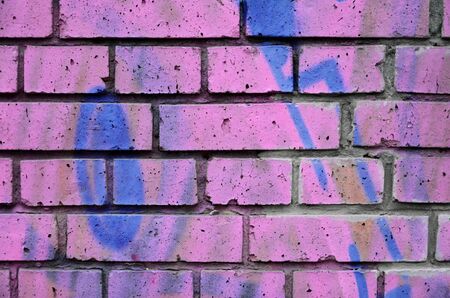 Old grunge wall with abstract colorful graffitiのeditorial素材