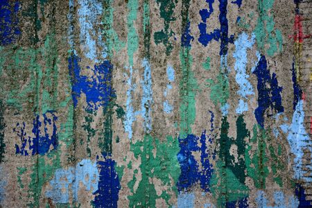 Old grunge wall with abstract colorful graffitiのeditorial素材