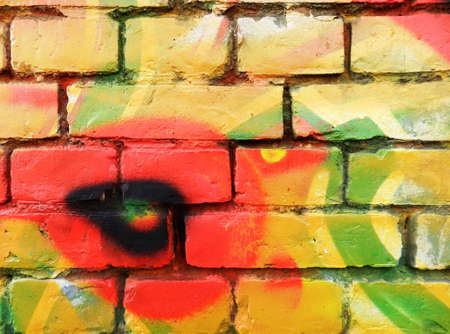 Grunge  brick wall with old paintのeditorial素材